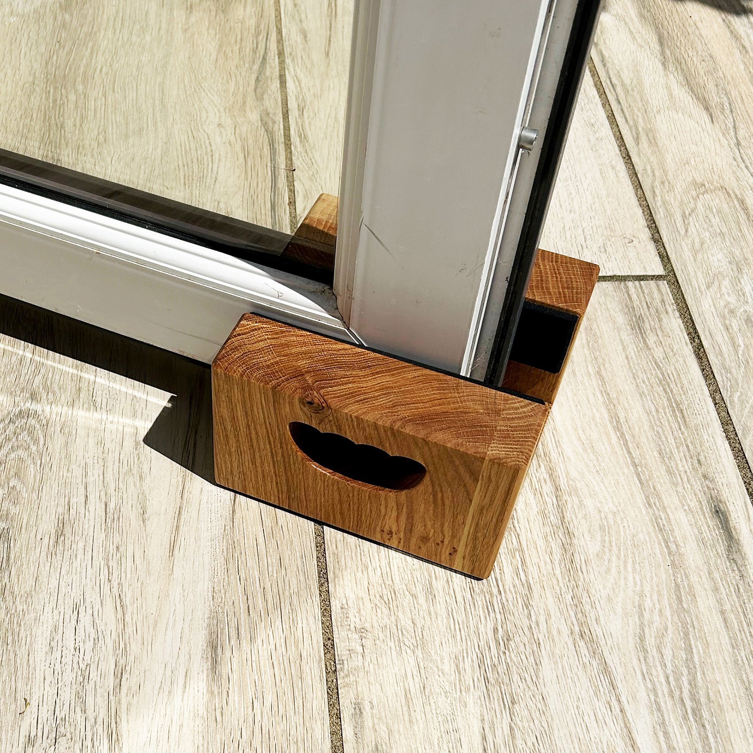 Door stop with a slot for patio doors The Natural Wood Company uk Ltd